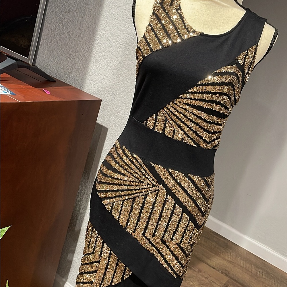 A’gaci black dress with gold